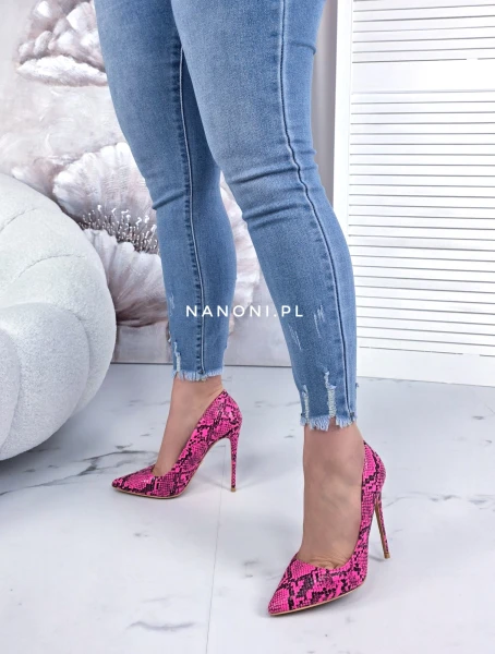 Spodnie Niebieskie Jeansowe Rurki Plus Size z Przetarciami 44-54  Laki